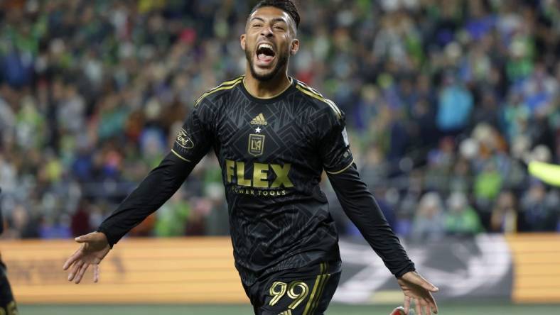 Nov 26, 2023; Seattle, Washington, USA; Los Angeles FC forward Denis Bouanga (99) reacts after scoring during the first half of a MLS Cup Western Conference Semifinal match against the Seattle Sounders at Lumen Field. Mandatory Credit: Joe Nicholson-USA TODAY Sports