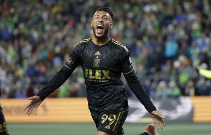 Nov 26, 2023; Seattle, Washington, USA; Los Angeles FC forward Denis Bouanga (99) reacts after scoring during the first half of a MLS Cup Western Conference Semifinal match against the Seattle Sounders at Lumen Field. Mandatory Credit: Joe Nicholson-USA TODAY Sports