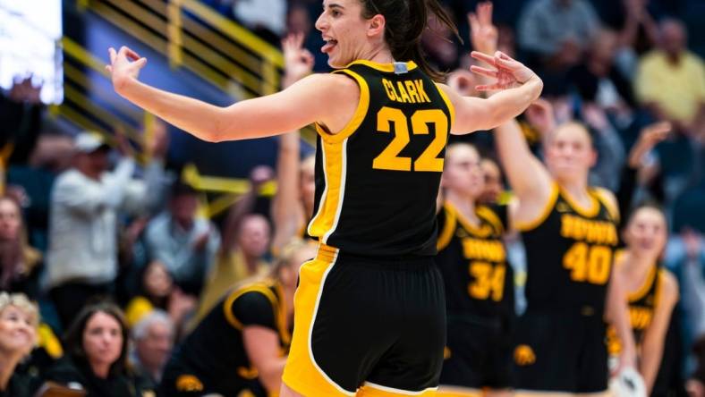 Iowa Hawkeyes guard Caitlin Clark (22) celebrates a three point basket during the third quarter of the Gulf Coast Showcase championship game against the Kansas State Wildcats at Hertz Arena in Estero on Sunday, Nov. 26, 2023.