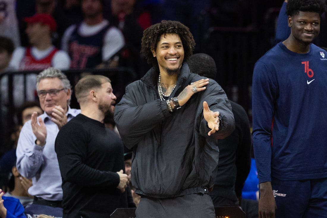 Nov 27, 2023; Philadelphia, Pennsylvania, USA; Philadelphia 76ers guard Kelly Oubre Jr. in street clothes reacts from the bench after a defensive stop against the Los Angeles Lakers during the third quarter at Wells Fargo Center. Mandatory Credit: Bill Streicher-USA TODAY Sports