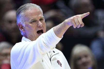 Nov 27, 2023; San Diego, California, USA; San Diego State Aztecs head coach Brian Dutcher gestures during the second half against the Point Loma Nazarene Sea Lions at Viejas Arena. Mandatory Credit: Orlando Ramirez-USA TODAY Sports