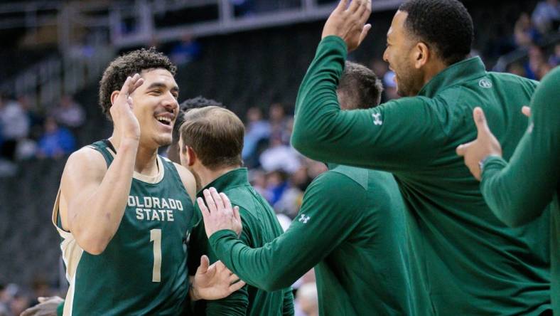 Nov 23, 2023; Kansas City, Missouri, USA; Colorado State Rams forward Joel Scott (1) celebrates with the bench during the game against the Creighton Bluejays at T-Mobile Center. Mandatory Credit: William Purnell-USA TODAY Sports