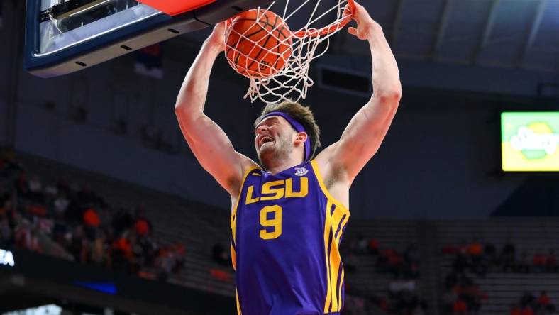 Nov 28, 2023; Syracuse, New York, USA; LSU Tigers forward Will Baker (9) dunks the ball against the Syracuse Orange during the first half at the JMA Wireless Dome. Mandatory Credit: Rich Barnes-USA TODAY Sports