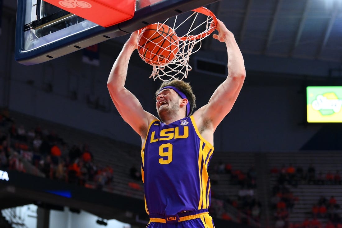 Nov 28, 2023; Syracuse, New York, USA; LSU Tigers forward Will Baker (9) dunks the ball against the Syracuse Orange during the first half at the JMA Wireless Dome. Mandatory Credit: Rich Barnes-USA TODAY Sports