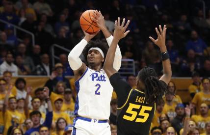 Nov 28, 2023; Pittsburgh, Pennsylvania, USA; Pittsburgh Panthers forward Blake Hinson (2) shoots a three point basket against Missouri Tigers guard Sean East II (55) during the second half at the Petersen Events Center. The Tigers won 71-64. Mandatory Credit: Charles LeClaire-USA TODAY Sports