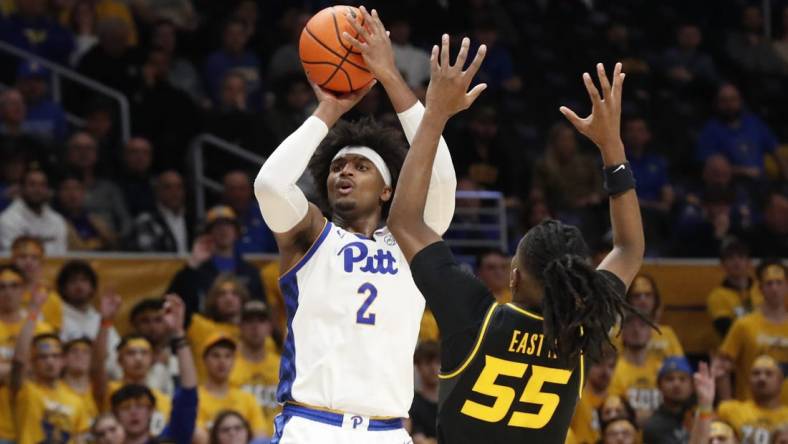 Nov 28, 2023; Pittsburgh, Pennsylvania, USA; Pittsburgh Panthers forward Blake Hinson (2) shoots a three point basket against Missouri Tigers guard Sean East II (55) during the second half at the Petersen Events Center. The Tigers won 71-64. Mandatory Credit: Charles LeClaire-USA TODAY Sports