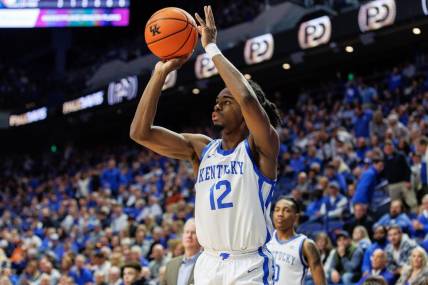 Nov 28, 2023; Lexington, Kentucky, USA; Kentucky Wildcats guard Antonio Reeves (12) shoots the ball during the second half against the Miami (Fl) Hurricanes at Rupp Arena at Central Bank Center. Mandatory Credit: Jordan Prather-USA TODAY Sports