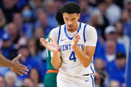Nov 28, 2023; Lexington, Kentucky, USA; Kentucky Wildcats forward Tre Mitchell (4) reacts during the first half against the Miami (Fl) Hurricanes at Rupp Arena at Central Bank Center. Mandatory Credit: Jordan Prather-USA TODAY Sports