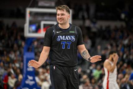 Nov 28, 2023; Dallas, Texas, USA; Dallas Mavericks guard Luka Doncic (77) reacts to a foul call against the Houston Rockets during the second half at the American Airlines Center. Mandatory Credit: Jerome Miron-USA TODAY Sports