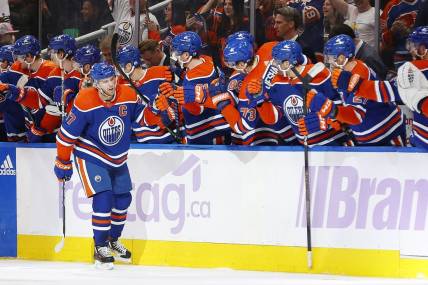 Nov 28, 2023; Edmonton, Alberta, CAN; Edmonton Oilers forward Connor McDavid (97) celebrates after scoring a goal during the second period against the Vegas Golden Knights at Rogers Place. Mandatory Credit: Perry Nelson-USA TODAY Sports