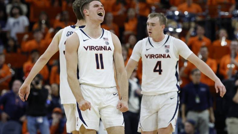 Nov 29, 2023; Charlottesville, Virginia, USA; Virginia Cavaliers guard Isaac McKneely (11) celebrates after the Cavaliers' game against the Texas A&M Aggies at John Paul Jones Arena. Mandatory Credit: Geoff Burke-USA TODAY Sports