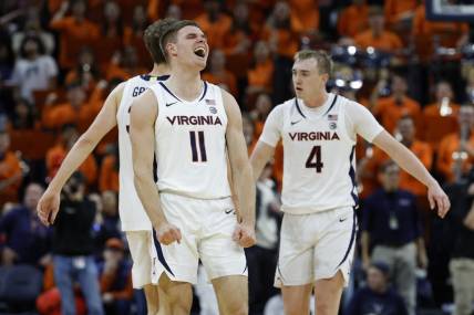 Nov 29, 2023; Charlottesville, Virginia, USA; Virginia Cavaliers guard Isaac McKneely (11) celebrates after the Cavaliers' game against the Texas A&M Aggies at John Paul Jones Arena. Mandatory Credit: Geoff Burke-USA TODAY Sports