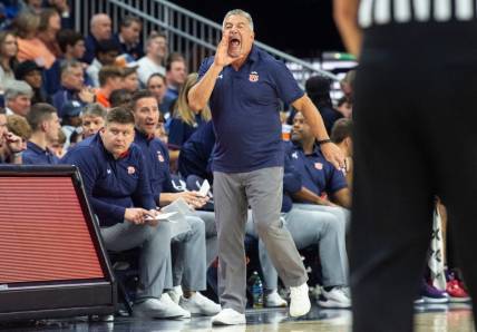 Auburn Tigers head coach Bruce Pearl talks with his team from the sideline as Auburn Tigers take on Virginia Tech Hokies at Neville Arena in Auburn, Ala., on Wednesday, Nov. 29, 2023. Auburn Tigers leads Virginia Tech Hokies 33-24 at halftime.