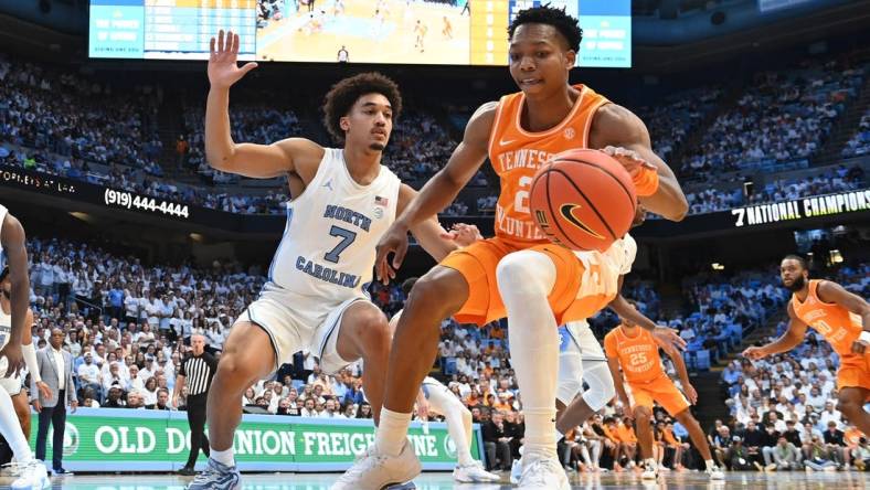 Nov 29, 2023; Chapel Hill, North Carolina, USA; Tennessee Volunteers guard Jordan Gainey (2) dribbles as North Carolina Tar Heels guard Seth Trimble (7) defends in the first half at Dean E. Smith Center. Mandatory Credit: Bob Donnan-USA TODAY Sports