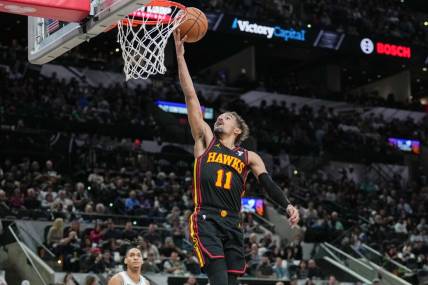 Nov 30, 2023; San Antonio, Texas, USA;  Atlanta Hawks guard Trae Young (11) lays the ball in during the second half against the San Antonio Spurs at the Frost Bank Center. Mandatory Credit: Daniel Dunn-USA TODAY Sports