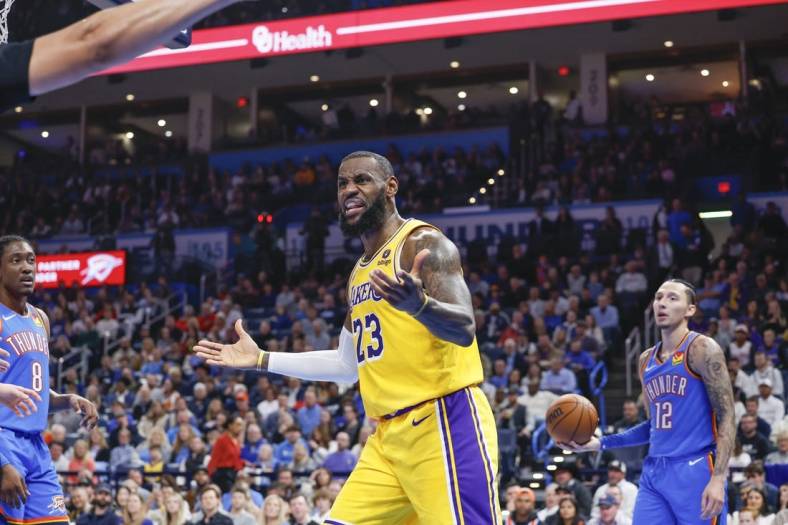 Nov 30, 2023; Oklahoma City, Oklahoma, USA; Los Angeles Lakers forward LeBron James (23) gestures after an officials call during the second quarter against the Oklahoma City Thunder at Paycom Center. Mandatory Credit: Alonzo Adams-USA TODAY Sports