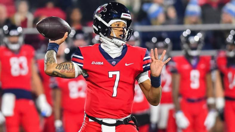 Dec 1, 2023; Lynchburg, VA, USA; Liberty Flames quarterback Kaidon Salter (7) throws a pass during the first quarter against the New Mexico State Aggies at Williams Stadium. Mandatory Credit: Brian Bishop-USA TODAY Sports