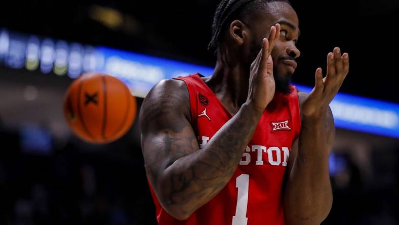 Dec 1, 2023; Cincinnati, Ohio, USA; Houston Cougars guard Jamal Shead (1) reacts after a play against the Xavier Musketeers in the second half at Cintas Center. Mandatory Credit: Katie Stratman-USA TODAY Sports