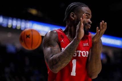 Dec 1, 2023; Cincinnati, Ohio, USA; Houston Cougars guard Jamal Shead (1) reacts after a play against the Xavier Musketeers in the second half at Cintas Center. Mandatory Credit: Katie Stratman-USA TODAY Sports