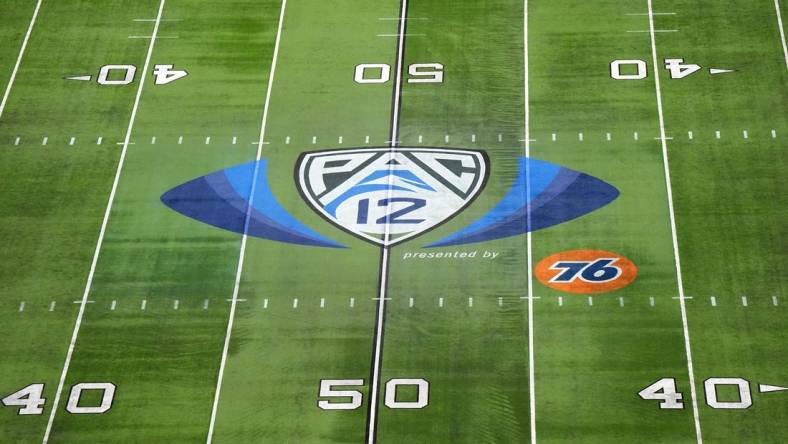 Dec 1, 2023; Las Vegas, NV, USA; The Pac-12 Conference logo at midfield at Allegiant Stadium. Mandatory Credit: Kirby Lee-USA TODAY Sports