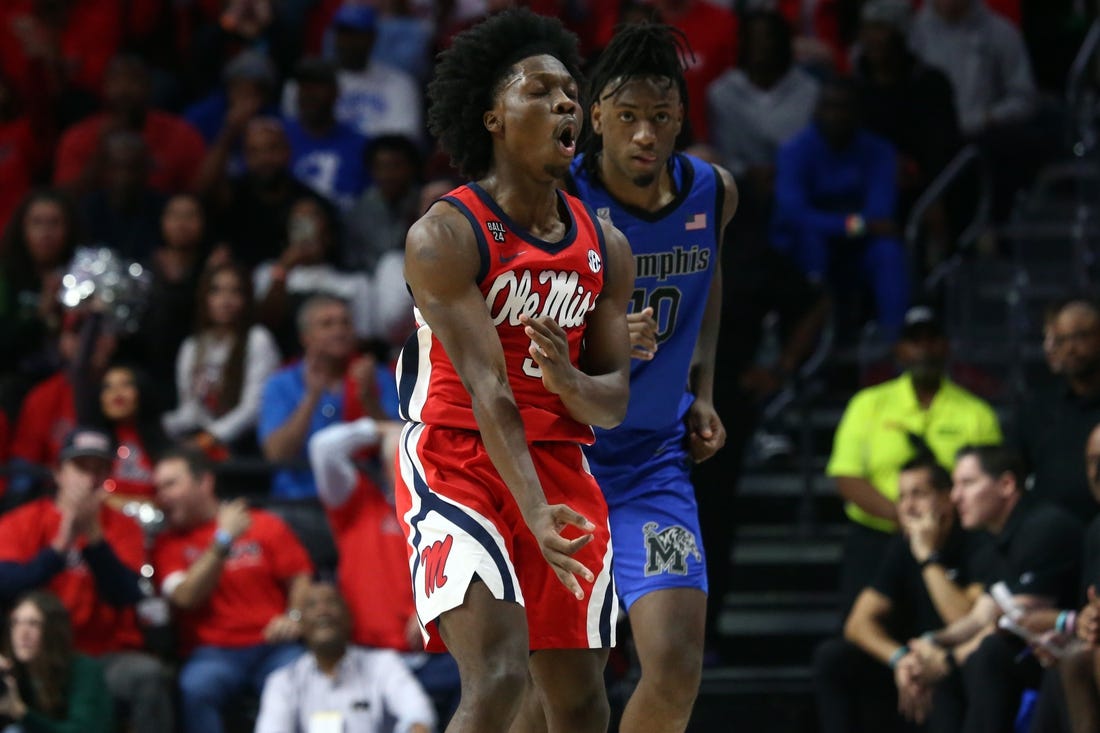 Dec 2, 2023; Oxford, Mississippi, USA; Mississippi Rebels guard Jaylen Murray (5) reacts after a three point basket against the Memphis Tigers during the first half at The Sandy and John Black Pavilion at Ole Miss. Mandatory Credit: Petre Thomas-USA TODAY Sports