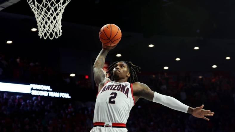 Dec 2, 2023; Tucson, Arizona, USA; Arizona Wildcats guard Caleb Love (2) dunks the ball against the Colgate Raiders during the second half at McKale Center. Mandatory Credit: Zachary BonDurant-USA TODAY Sports