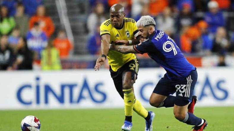 Dec 2, 2023; Cincinnati, Ohio, USA; Columbus Crew midfielder Darlington Nagbe (6) battles for the ball against FC Cincinnati midfielder Junior Moreno (93) during the first half at TQL Stadium. Mandatory Credit: Katie Stratman-USA TODAY Sports