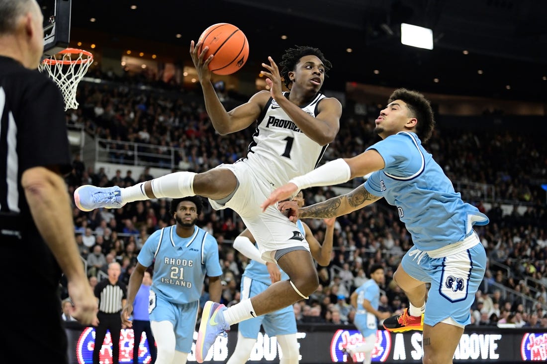 Dec 2, 2023; Providence, Rhode Island, USA; Providence Friars guard Jayden Pierre (1) grabs his own rebound during the first half against the Rhode Island Rams at Amica Mutual Pavilion. Mandatory Credit: Eric Canha-USA TODAY Sports