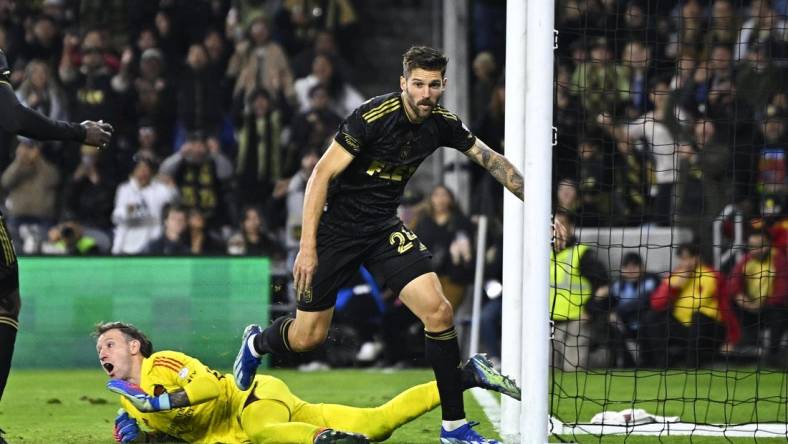 Dec 2, 2023; Los Angeles, California, USA; Los Angeles FC midfielder Ryan Hollingshead (24) reacts after scoring a goal against the Houston Dynamo in the first half for the MLS Cup Western Conference Final at BMO Stadium. Mandatory Credit: Kelvin Kuo-USA TODAY Sports