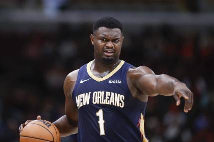 Dec 2, 2023; Chicago, Illinois, USA; New Orleans Pelicans forward Zion Williamson (1) brings the ball up court against the Chicago Bulls during the first half at United Center. Mandatory Credit: Kamil Krzaczynski-USA TODAY Sports