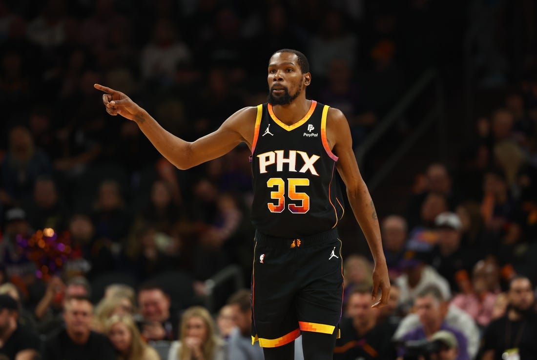 Dec 2, 2023; Phoenix, Arizona, USA; Phoenix Suns forward Kevin Durant (35) against the Memphis Grizzlies in the second half at Footprint Center. Mandatory Credit: Mark J. Rebilas-USA TODAY Sports