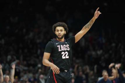 Dec 2, 2023; Las Vegas, Nevada, USA; Gonzaga Bulldogs forward Anton Watson (22) celebrates against the Southern California Trojans in the first half during the Legends of Basketball Las Vegas Invitational at MGM Grand Garden Arena. Mandatory Credit: Kirby Lee-USA TODAY Sports
