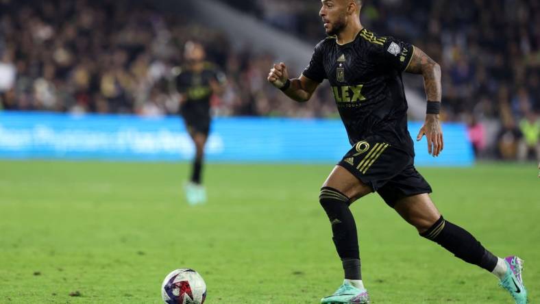 Dec 2, 2023; Los Angeles, California, USA;  Los Angeles FC forward Denis Bouanga (99) dribbles the ball during the second half against the Houston Dynamo at BMO Stadium. Mandatory Credit: Kiyoshi Mio-USA TODAY Sports