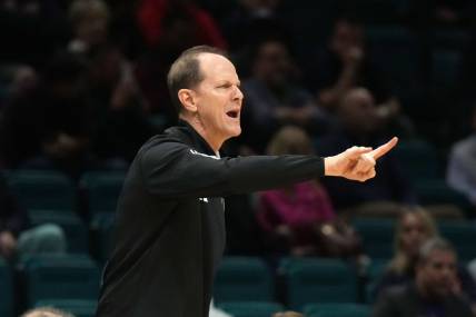 Dec 2, 2023; Las Vegas, Nevada, USA; Washington Huskies coach Mike Hopkins gestures in the second half against the Colorado State Rams during the Legends of Basketball Las Vegas Invitational at MGM Grand Garden Arena. Mandatory Credit: Kirby Lee-USA TODAY Sports