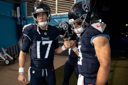 Tennessee Titans quarterback Ryan Tannehill (17), quarterback Malik Willis (7), and quarterback Will Levis (8) huddle before a game against the Indianapolis Colts at Nissan Stadium in Nashville, Tenn., Sunday, Dec. 3, 2023.