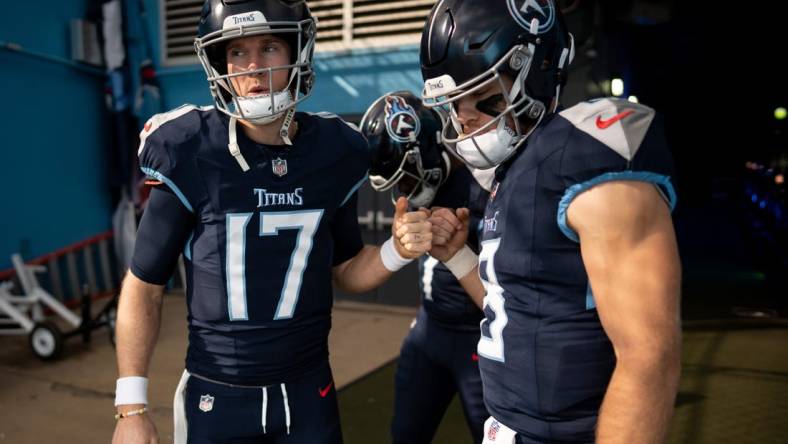 Tennessee Titans quarterback Ryan Tannehill (17), quarterback Malik Willis (7), and quarterback Will Levis (8) huddle before a game against the Indianapolis Colts at Nissan Stadium in Nashville, Tenn., Sunday, Dec. 3, 2023.