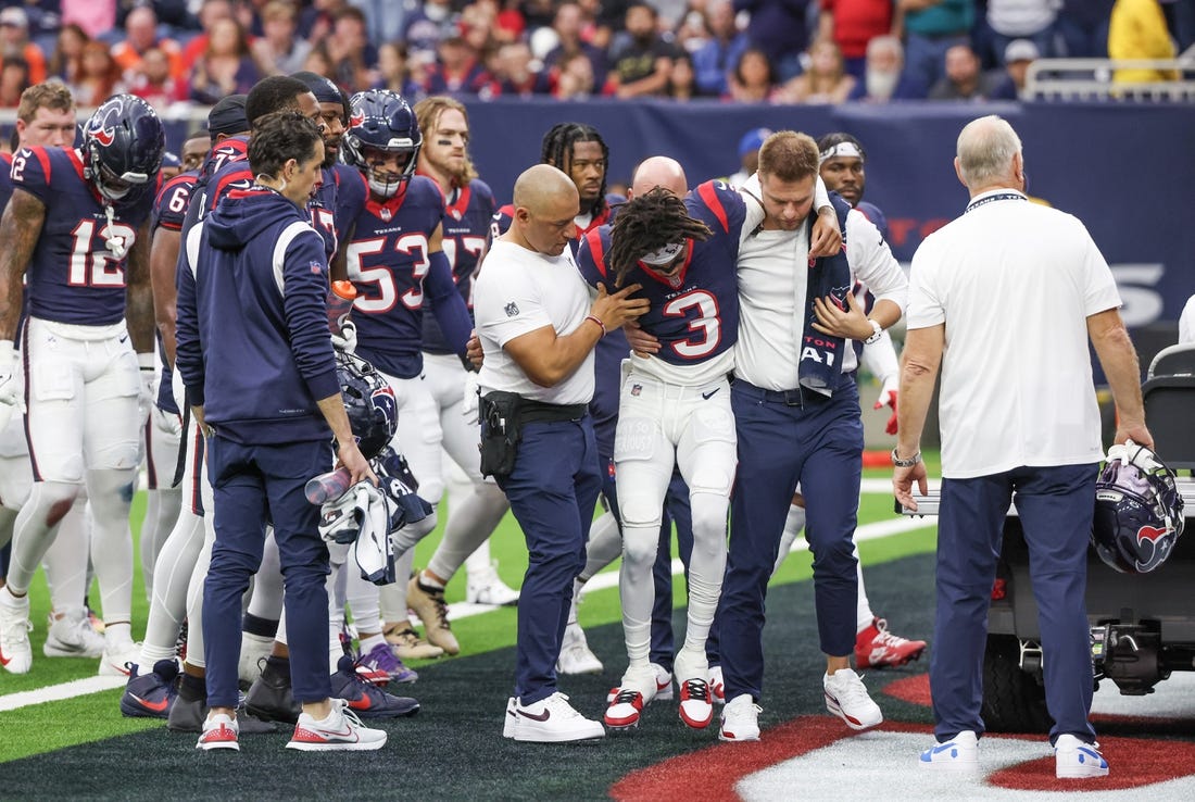 Dec 3, 2023; Houston, Texas, USA;  Trainers move an injured Houston Texans wide receiver Tank Dell (3) two the cart as he injured himself on a touchdown play against the Denver Broncos at NRG Stadium. Mandatory Credit: Thomas Shea-USA TODAY Sports