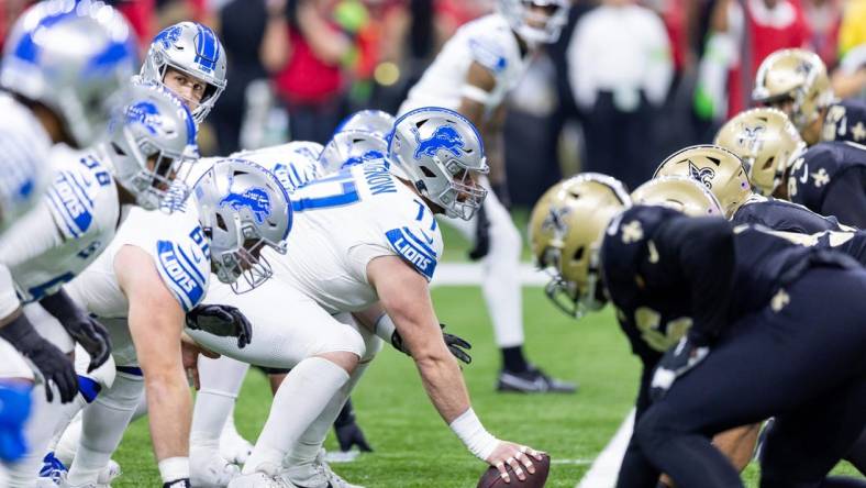 Dec 3, 2023; New Orleans, Louisiana, USA; Detroit Lions center Frank Ragnow (77) lines up against the New Orleans Saints during the first half at Caesars Superdome. Mandatory Credit: Stephen Lew-USA TODAY Sports