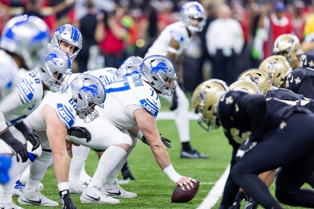 Dec 3, 2023; New Orleans, Louisiana, USA; Detroit Lions center Frank Ragnow (77) lines up against the New Orleans Saints during the first half at Caesars Superdome. Mandatory Credit: Stephen Lew-USA TODAY Sports