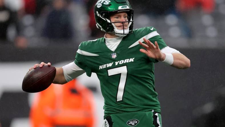 Dec 3, 2023; East Rutherford, New Jersey, USA; New York Jets quarterback Tim Boyle (7) drops back to pass against the Atlanta Falcons during the third quarter at MetLife Stadium. Mandatory Credit: Brad Penner-USA TODAY Sports