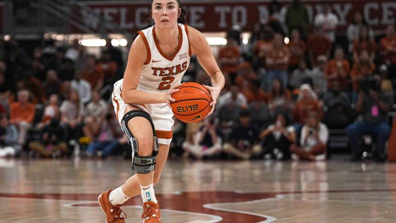 Texas Longhorns guard Shaylee Gonzales (2) looks for an open teammate for a pass during the women's basketball game at the Moody Center on Sunday, Dec. 3, 2023 in Austin.