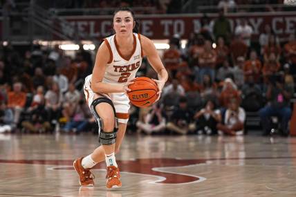 Texas Longhorns guard Shaylee Gonzales (2) looks for an open teammate for a pass during the women's basketball game at the Moody Center on Sunday, Dec. 3, 2023 in Austin.