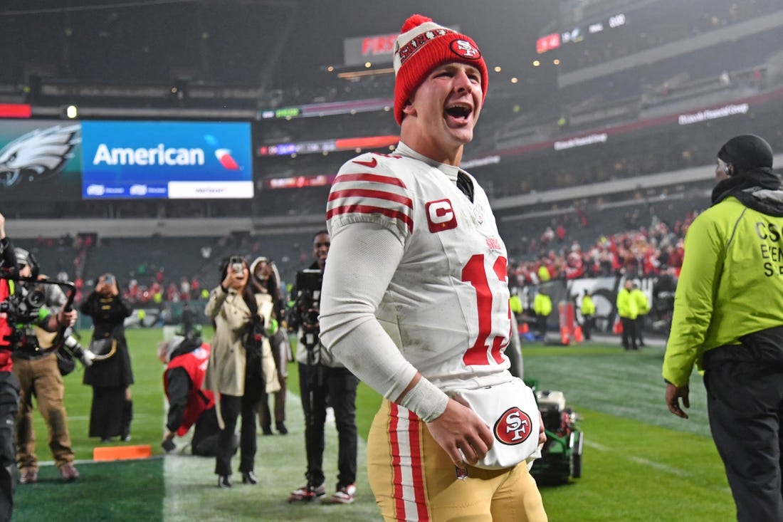 Dec 3, 2023; Philadelphia, Pennsylvania, USA; San Francisco 49ers quarterback Brock Purdy (13) walks off the field after win against the Philadelphia Eagles at Lincoln Financial Field. Mandatory Credit: Eric Hartline-USA TODAY Sports