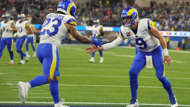 Los Angeles Rams running back Kyren Williams (23) celebrates with quarterback Matthew Stafford (9) in the fourth quarter against the Cleveland Browns SoFi Stadium. Mandatory Credit: Kirby Lee-USA TODAY Sports