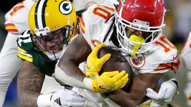 Green Bay Packers linebacker Preston Smith (91) tackles Kansas City Chiefs running back Isiah Pacheco (10) during their football game Sunday, December 3, 2023, at Lambeau Field in Green Bay, Wis.
Wm. Glasheen USA TODAY NETWORK-Wisconsin