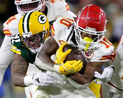Green Bay Packers linebacker Preston Smith (91) tackles Kansas City Chiefs running back Isiah Pacheco (10) during their football game Sunday, December 3, 2023, at Lambeau Field in Green Bay, Wis.
Wm. Glasheen USA TODAY NETWORK-Wisconsin