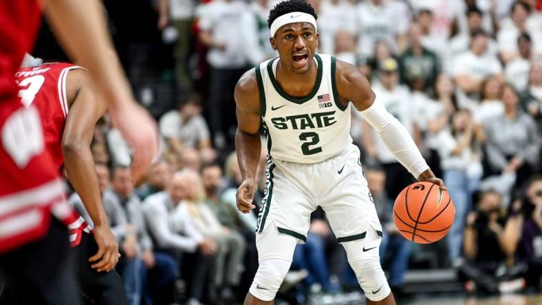 Michigan State's Tyson Walker calls out to teammates during the first half in the game against Wisconsin on Tuesday, Dec. 5, 2023, at the Breslin Center in East Lansing.