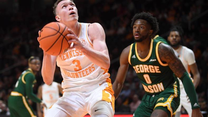 Tennessee guard Dalton Knecht (3) takes a shot during an NCAA college basketball game between Tennessee and George Mason at Thompson-Boling Arena at Food City Center, Tuesday, Dec. 5, 2023.