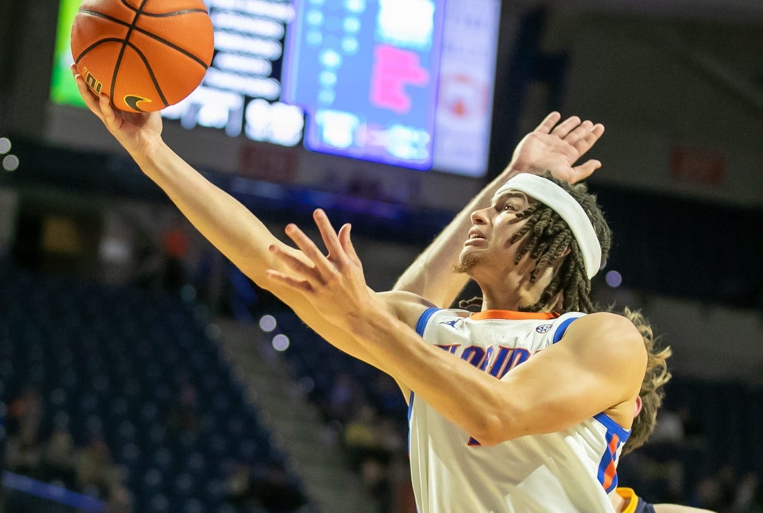 Florida Gators guard Walter Clayton Jr. (1) shoots during first half action of an NCAA basketball game as Florida Gators take on Merrimack College Warrors at Exactech Areana in Gainesville, FL on Tuesday, December 5, 2023. [Alan Youngblood/Gainesville Sun]