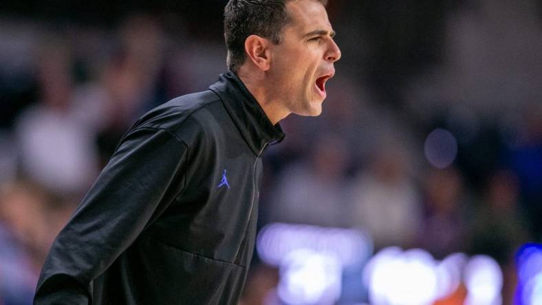 Florida Gators head coach Todd Golden yells during second half action of an NCAA basketball game as Florida Gators take on Merrimack College Warrors at Exactech Areana in Gainesville, FL on Tuesday, December 5, 2023. [Alan Youngblood/Gainesville Sun]